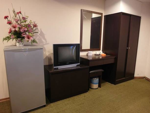 Imagen de la habitación del Hotel Li Garden. Foto 15