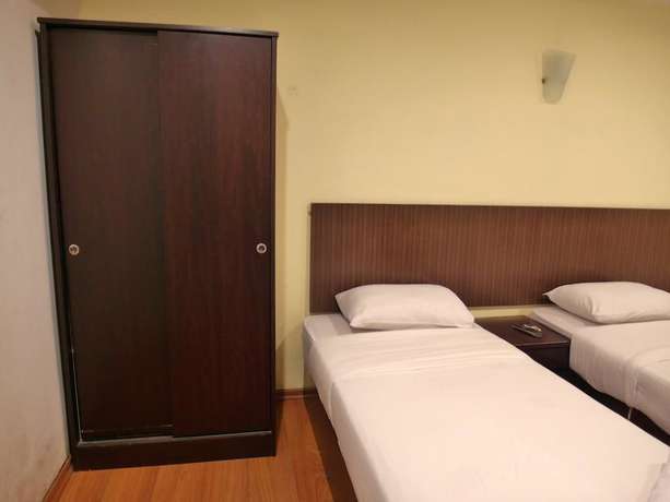 Imagen de la habitación del Hotel Li Garden. Foto 16