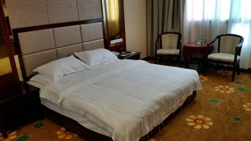 Imagen de la habitación del Hotel Li Ping. Foto 4