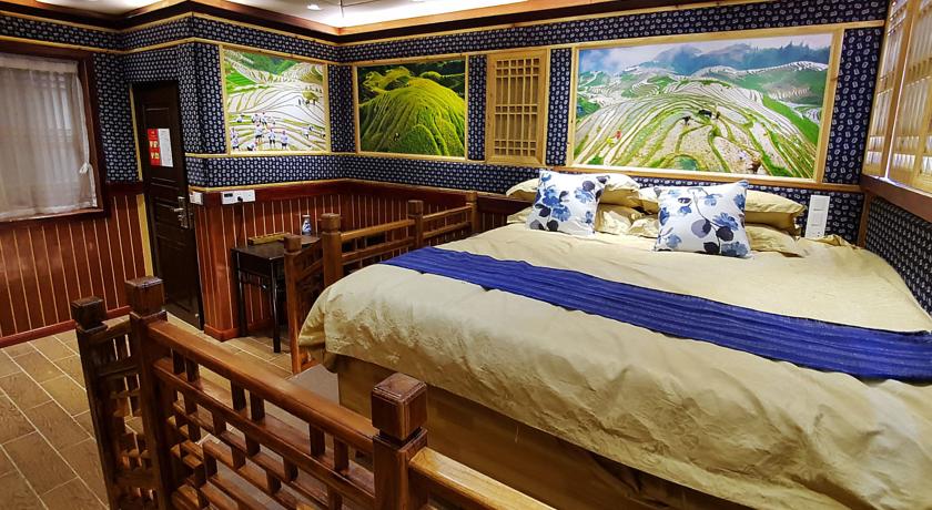 Imagen de la habitación del Hotel Li River. Foto 12