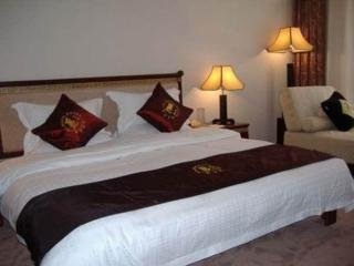 Imagen de la habitación del Hotel Li Wang Lijiang. Foto 4