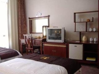 Imagen de la habitación del Hotel Li Wang Lijiang. Foto 5
