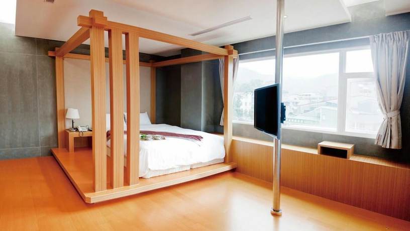 Imagen de la habitación del Hotel LiChiuan Hotel Spring Hotel. Foto 11
