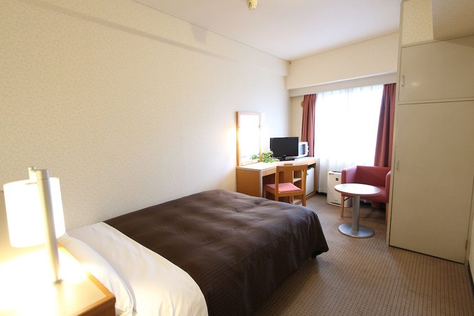 Imagen de la habitación del Hotel LiVEMAX BUDGET Yokohama Kannai. Foto 2