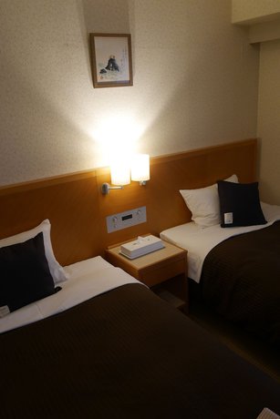 Imagen de la habitación del Hotel LiVEMAX BUDGET Yokohama Kannai. Foto 5
