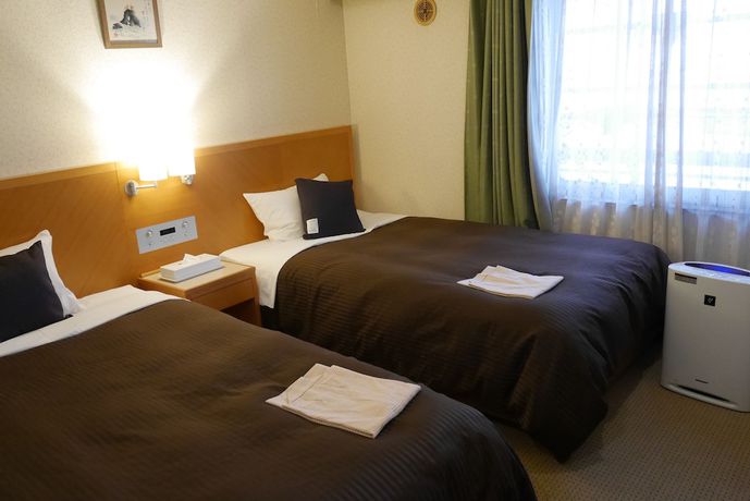 Imagen de la habitación del Hotel LiVEMAX BUDGET Yokohama Kannai. Foto 9
