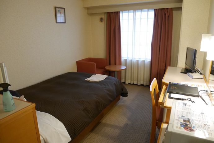 Imagen de la habitación del Hotel LiVEMAX BUDGET Yokohama Kannai. Foto 12
