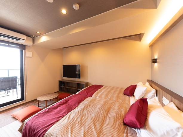 Imagen de la habitación del Hotel LiVEMAX RESORT ATAMI SEA FRONT. Foto 6