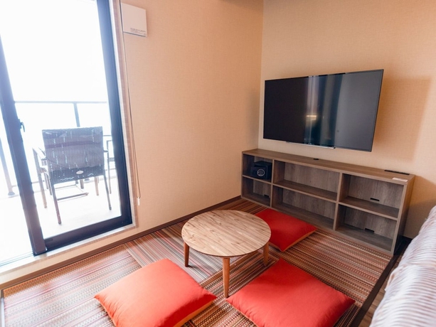 Imagen de la habitación del Hotel LiVEMAX RESORT ATAMI SEA FRONT. Foto 7