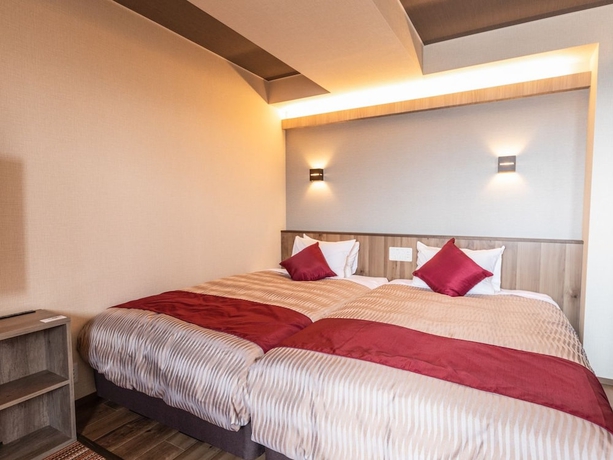 Imagen de la habitación del Hotel LiVEMAX RESORT ATAMI SEA FRONT. Foto 10