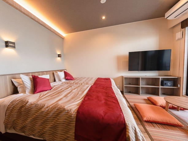 Imagen de la habitación del Hotel LiVEMAX RESORT ATAMI SEA FRONT. Foto 12