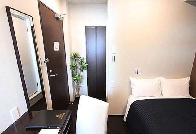 Imagen de la habitación del Hotel LiVEMAX Saitama Asakaekimae. Foto 9