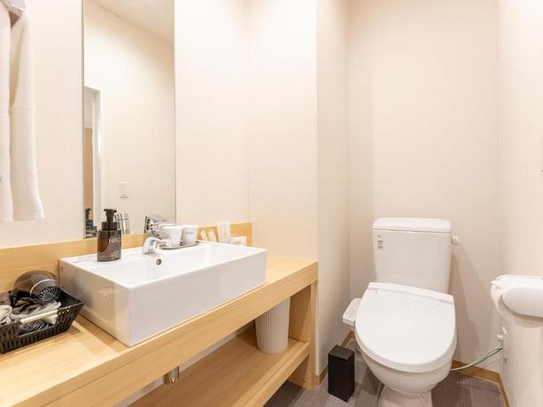 Imagen de la habitación del Hotel LiVEMAX Sakishima Cosmo Tower. Foto 4