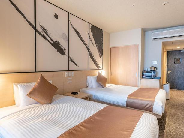 Imagen de la habitación del Hotel LiVEMAX Sakishima Cosmo Tower. Foto 5