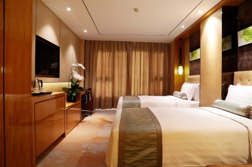 Imagen de la habitación del Hotel Lia Beijing. Foto 9