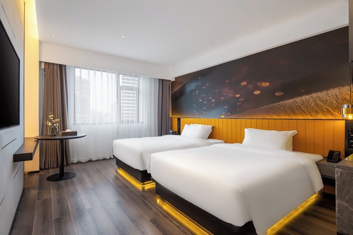 Imagen de la habitación del Hotel LiangZhi Huipin, HAIKOU. Foto 4