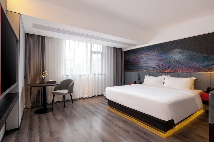 Imagen de la habitación del Hotel LiangZhi Huipin, HAIKOU. Foto 8