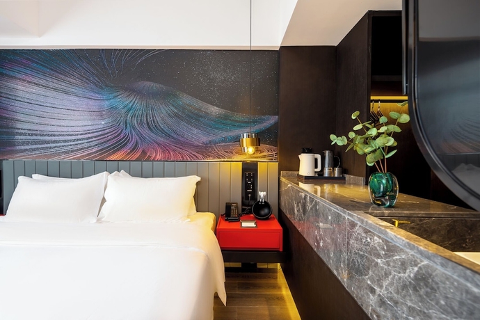 Imagen de la habitación del Hotel LiangZhi Huipin, HAIKOU. Foto 9