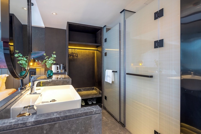 Imagen de la habitación del Hotel LiangZhi Huipin, HAIKOU. Foto 14