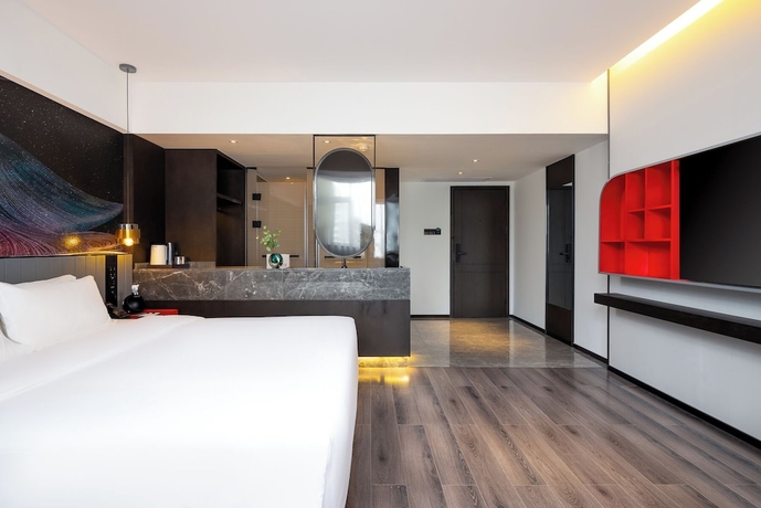 Imagen de la habitación del Hotel LiangZhi Huipin, HAIKOU. Foto 16