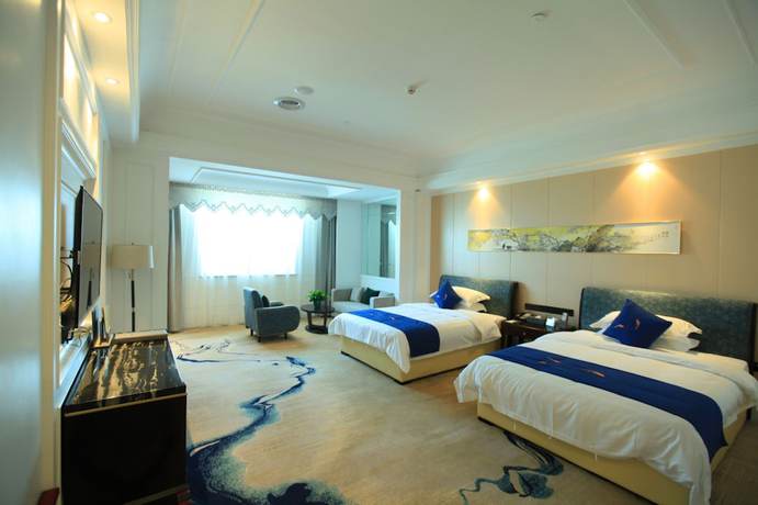 Imagen de la habitación del Hotel Liangchen Meijing. Foto 3