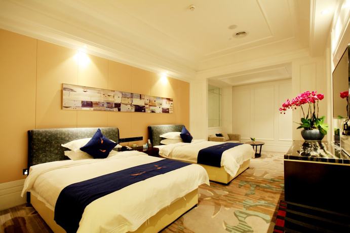 Imagen de la habitación del Hotel Liangchen Meijing. Foto 9