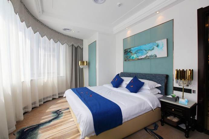 Imagen de la habitación del Hotel Liangchen Meijing. Foto 13