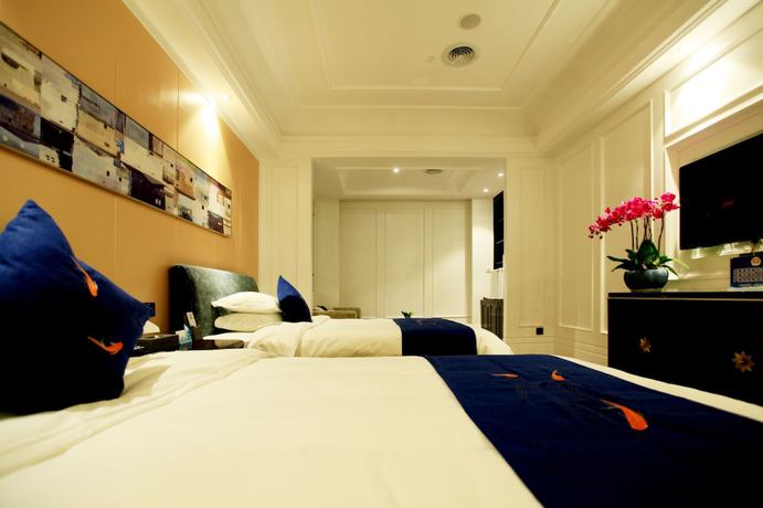 Imagen de la habitación del Hotel Liangchen Meijing. Foto 14