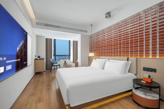 Imagen de la habitación del Hotel Liangzhi Huipin, HAIKOU. Foto 2