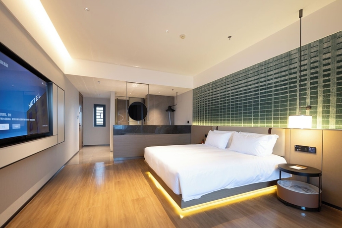 Imagen de la habitación del Hotel Liangzhi Huipin, HAIKOU. Foto 3