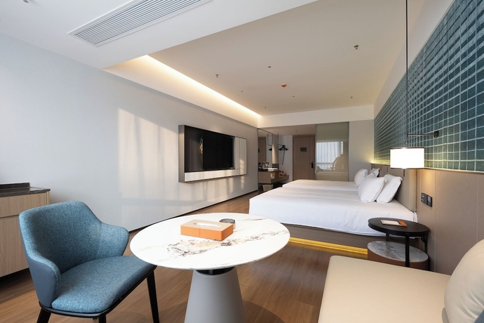Imagen de la habitación del Hotel Liangzhi Huipin, HAIKOU. Foto 5