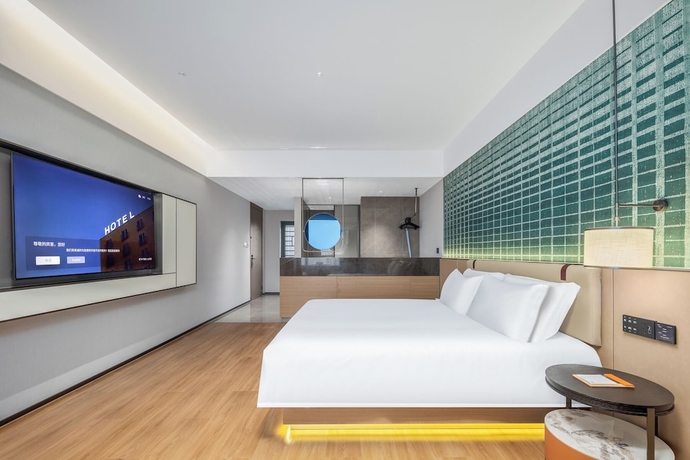 Imagen de la habitación del Hotel Liangzhi Huipin, HAIKOU. Foto 6
