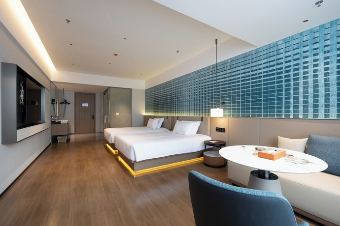 Imagen de la habitación del Hotel Liangzhi Huipin, HAIKOU. Foto 11