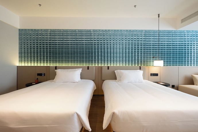 Imagen de la habitación del Hotel Liangzhi Huipin, HAIKOU. Foto 12