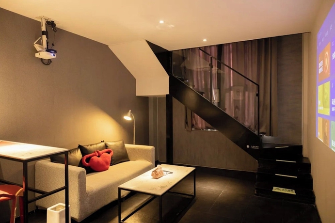Imagen de la habitación del Hotel Liangzhu Guesthouse. Foto 2