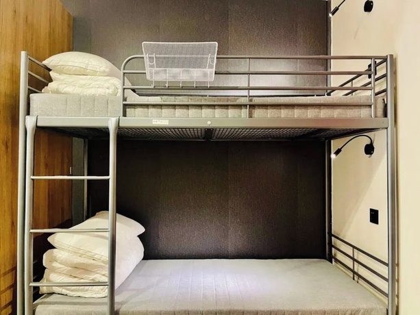 Imagen de la habitación del Hotel Liangzhu Guesthouse. Foto 11