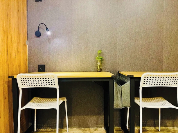 Imagen de la habitación del Hotel Liangzhu Guesthouse. Foto 12