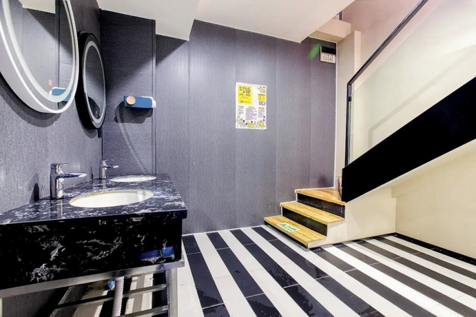 Imagen de la habitación del Hotel Liangzhu Guesthouse. Foto 13