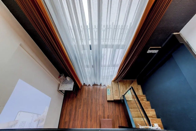 Imagen de la habitación del Hotel Liangzhu Guesthouse. Foto 15