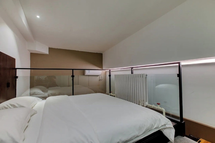 Imagen de la habitación del Hotel Liangzhu Guesthouse. Foto 16