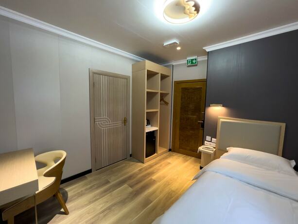 Imagen de la habitación del Hotel Liao. Foto 17
