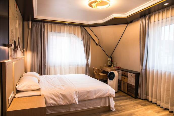 Imagen de la habitación del Hotel Liao. Foto 19