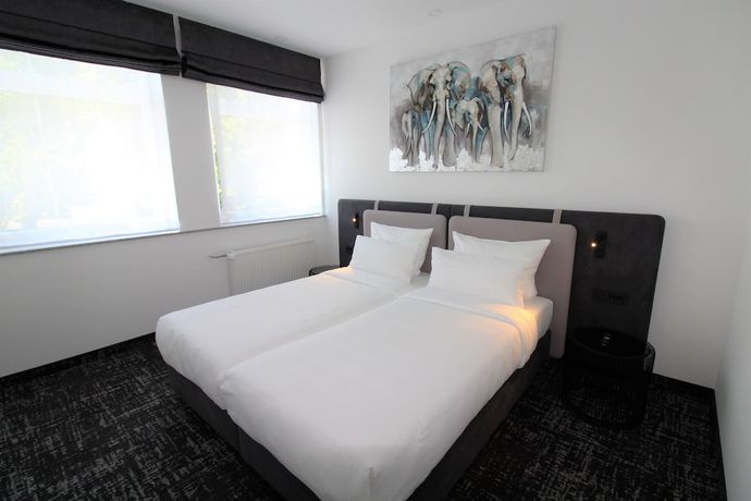 Imagen de la habitación del Hotel Libartys. Foto 13