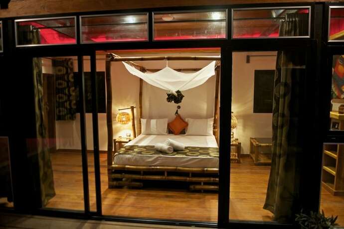 Imagen de la habitación del Hotel Libassa Ecolodge. Foto 11