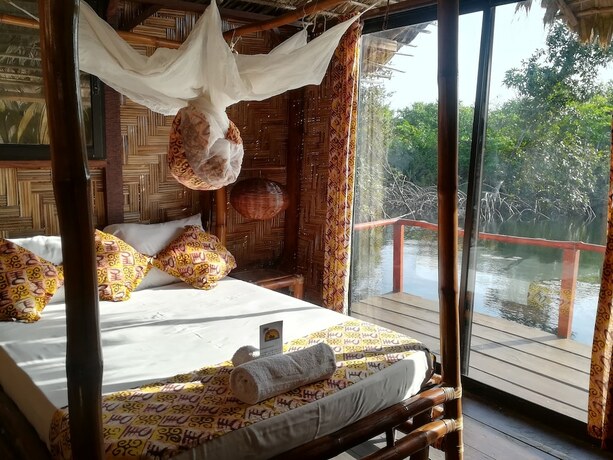 Imagen de la habitación del Hotel Libassa Ecolodge. Foto 13