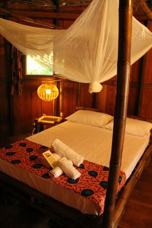 Imagen de la habitación del Hotel Libassa Ecolodge. Foto 15