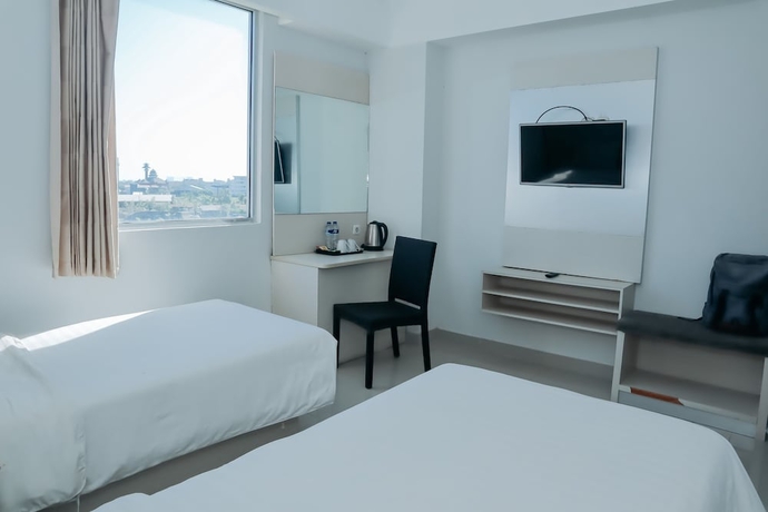 Imagen de la habitación del Hotel Liberta Grand Sayang Makassar. Foto 6