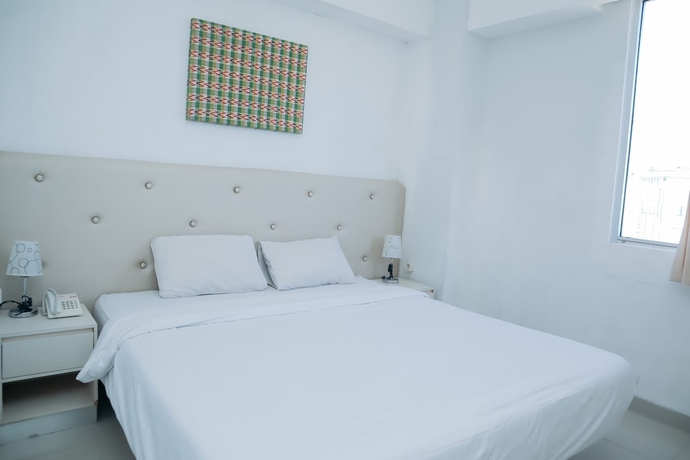 Imagen de la habitación del Hotel Liberta Grand Sayang Makassar. Foto 8