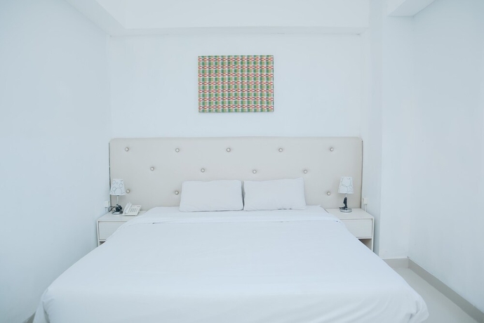 Imagen de la habitación del Hotel Liberta Grand Sayang Makassar. Foto 14