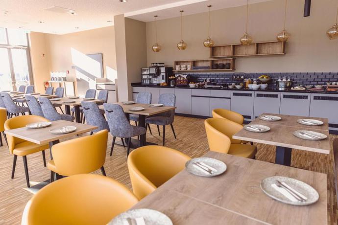 Imagen del bar/restaurante del Hotel Libertas elements pure. Foto 5